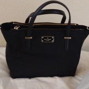 Kate Spade, black shiney material type, nice new super nice easy access.